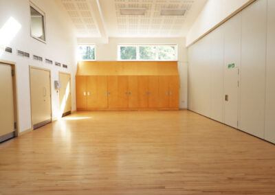 The Maddocks Hall Gamlingay Eco hub A light and airy section of the main hall with high ceiling and wooden floor